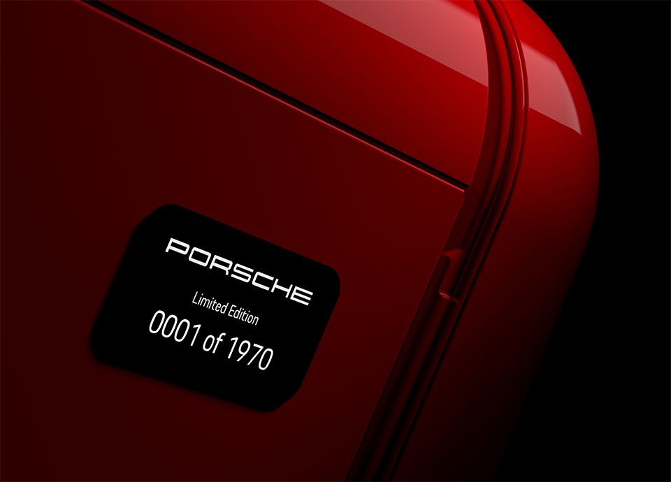 Black metal plate located on the side of the refrigerator, engraved with the product identification number.