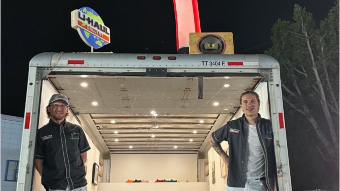 Jack Chase and James Sundquist in front of U-Haul Gallery.